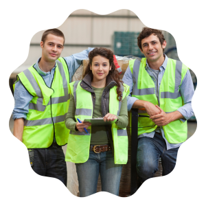 three warehouse workers in hi vis vests