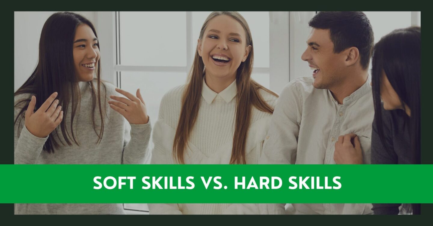 a group of young coworkers, 2 women and 1 man laughing and gesturing while having a discussion