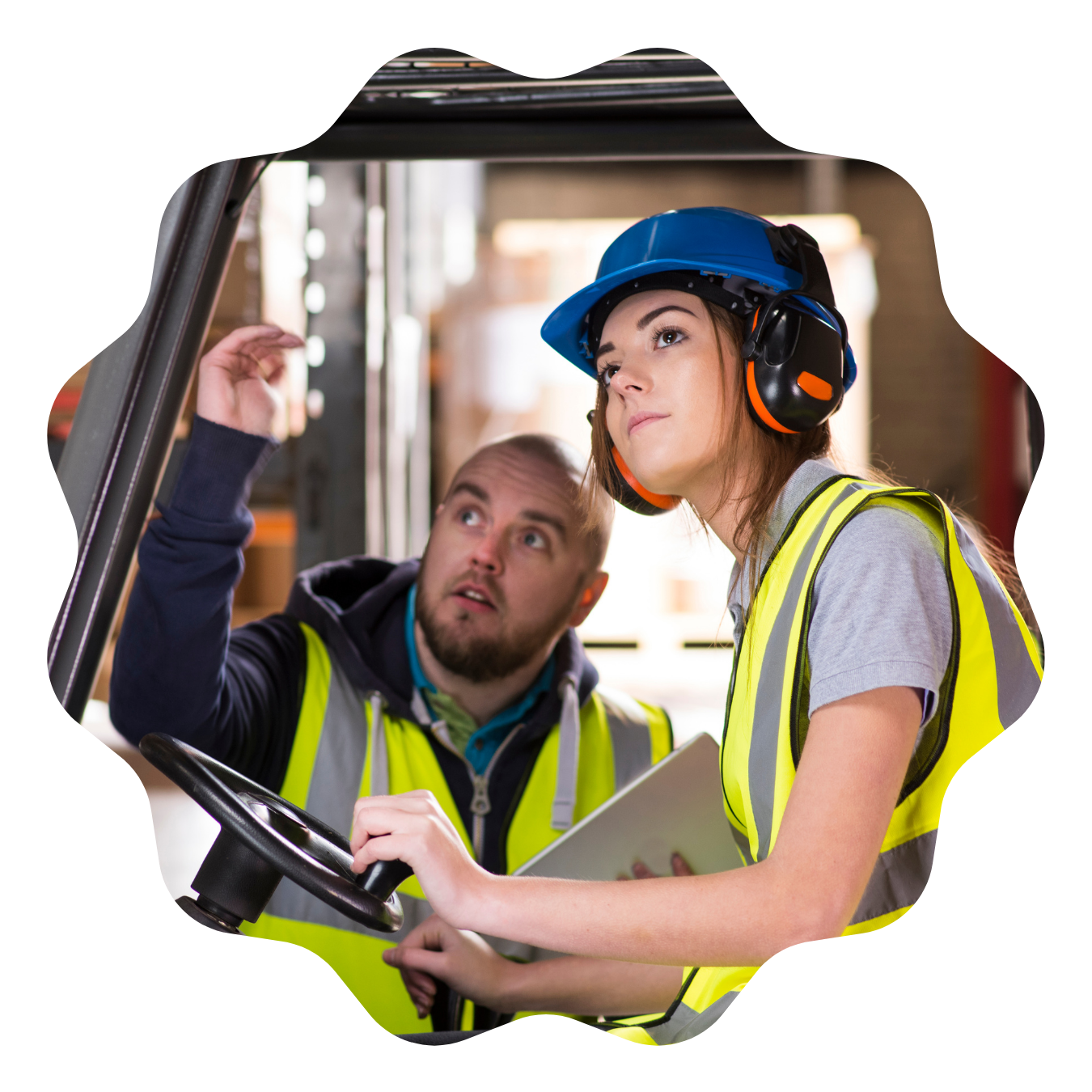 woman getting trained on the forklift