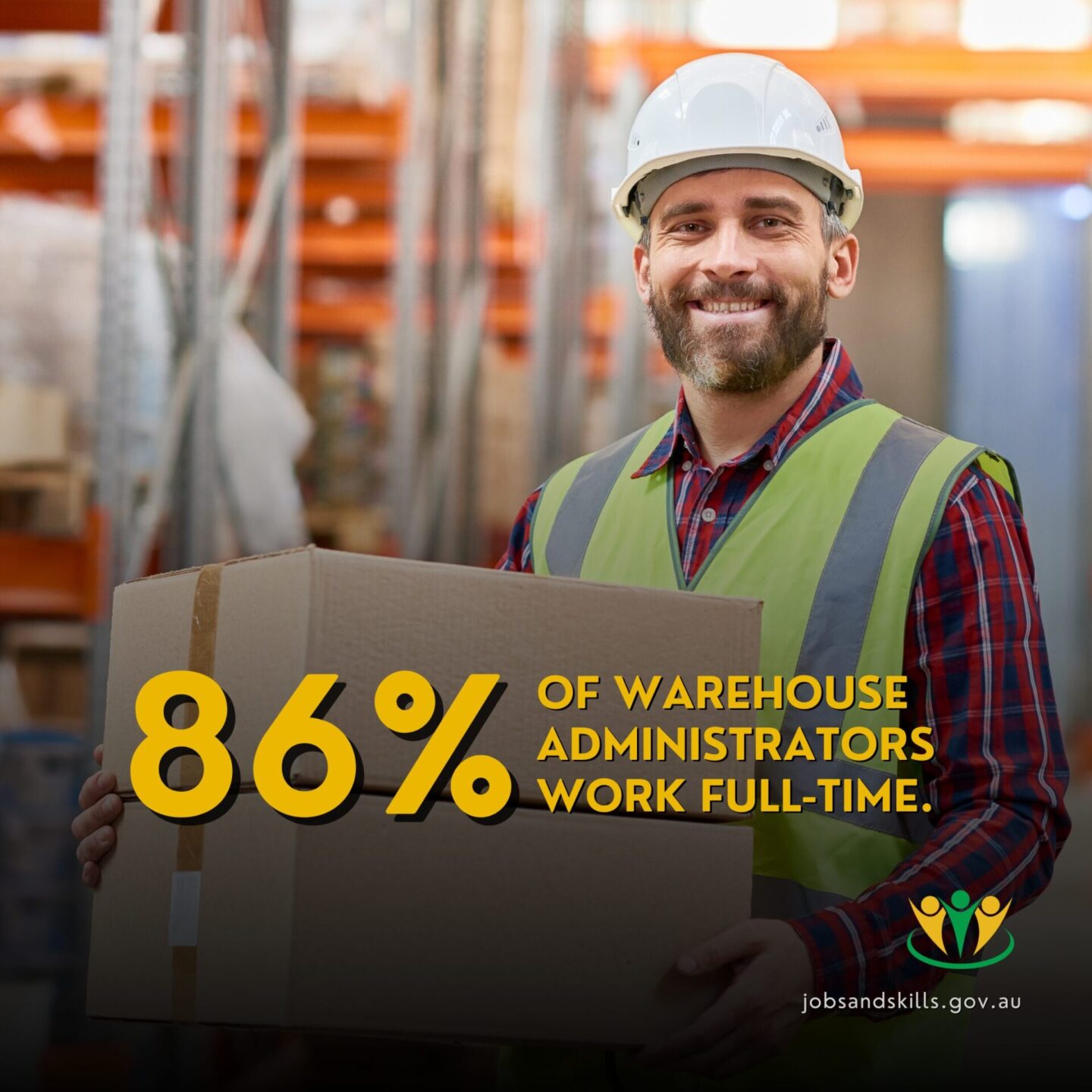 The Reality of Working in a Warehouse: 5 Things You Should Know 4 a smiling worker holding two boxes in a warehouse